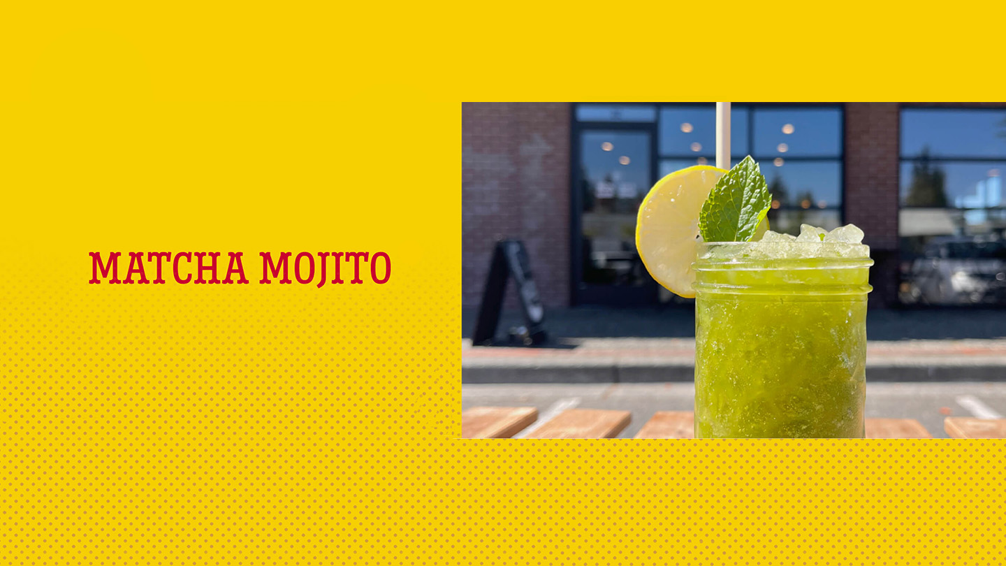 Glass of Matcha Mojito on a street scenario